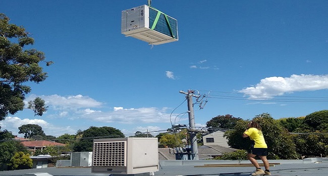 Commercial rooftop air conditioning equipment serviced by Cool First